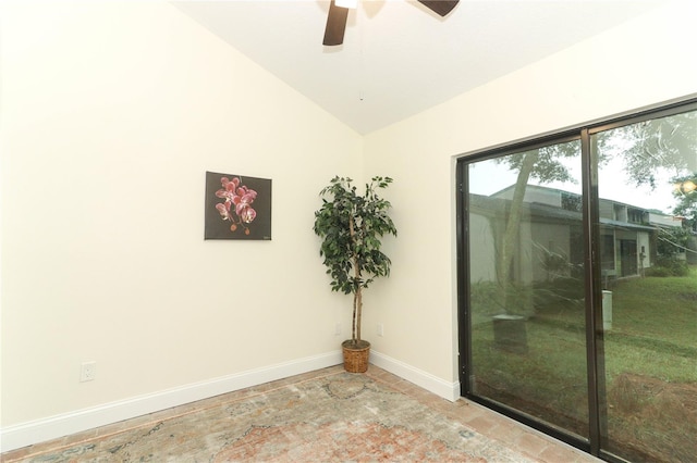 spare room featuring ceiling fan and lofted ceiling