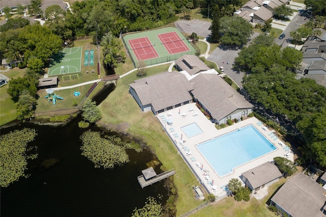 birds eye view of property featuring a water view