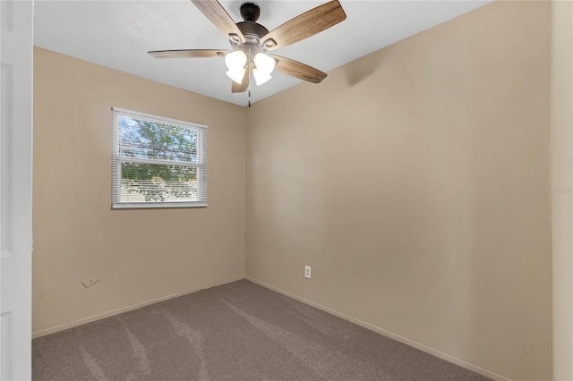 empty room with carpet and ceiling fan