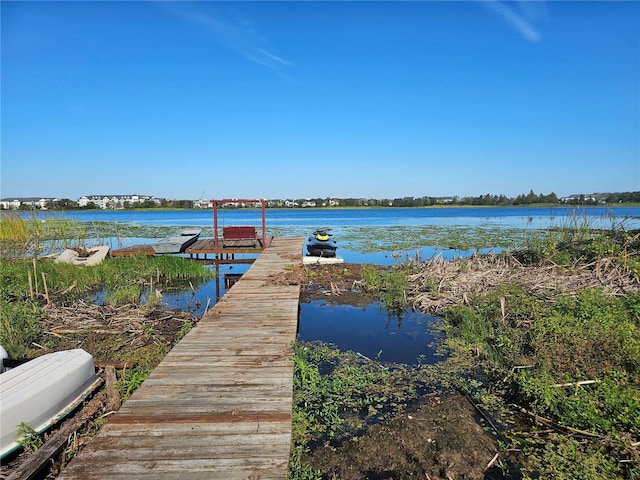 view of dock with a water view