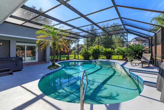 view of swimming pool featuring a patio and glass enclosure