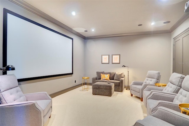 home theater room featuring crown molding and carpet