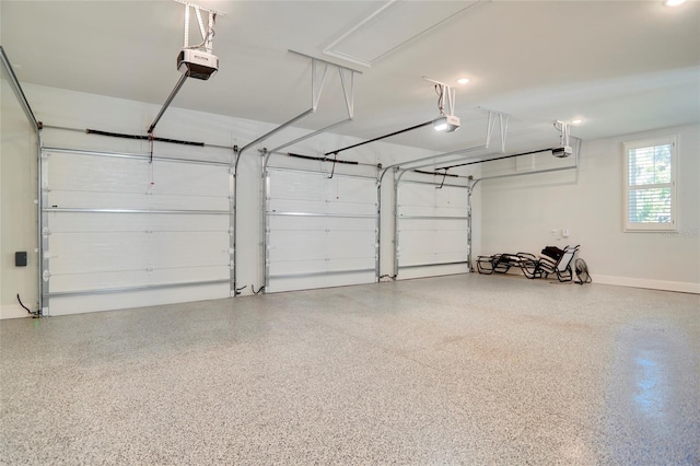 garage featuring a garage door opener