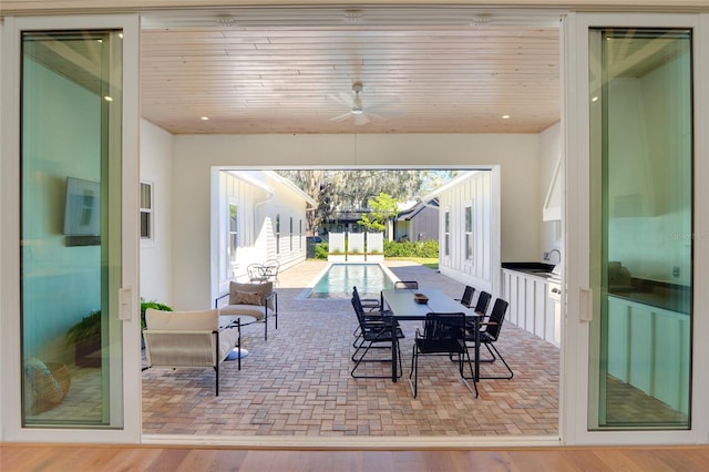 dining space featuring light hardwood / wood-style floors, a wealth of natural light, and ceiling fan