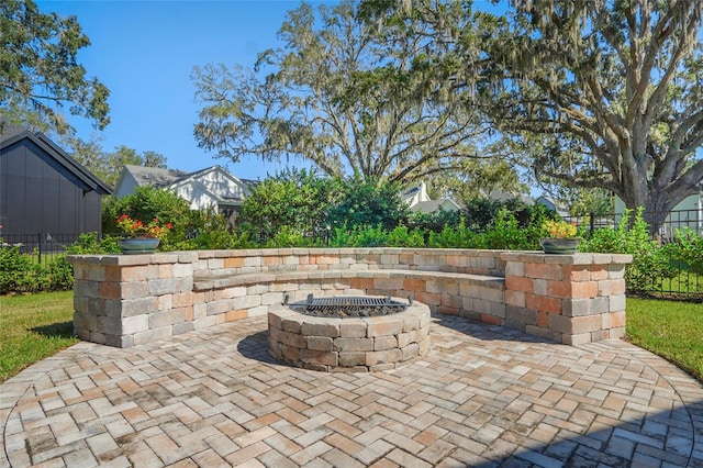 view of patio with an outdoor fire pit