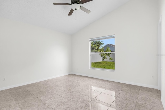 spare room featuring high vaulted ceiling, a textured ceiling, light tile patterned floors, and ceiling fan