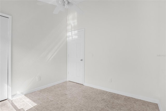 unfurnished room featuring ceiling fan