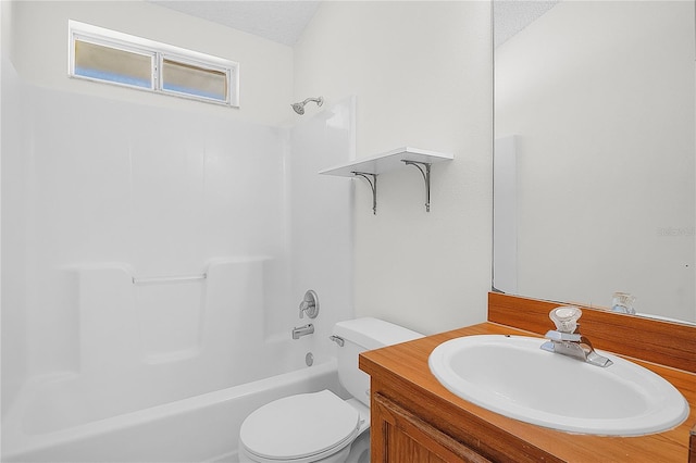 full bathroom with vanity, shower / tub combination, a textured ceiling, and toilet