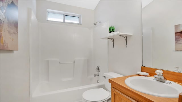 full bath with vanity, toilet, and washtub / shower combination