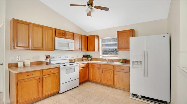 kitchen featuring a sink, white appliances, lofted ceiling, and light countertops