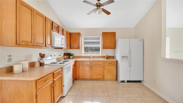 kitchen featuring ceiling fan, light countertops, vaulted ceiling, light tile patterned floors, and white appliances