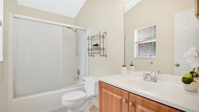 full bath featuring enclosed tub / shower combo, toilet, and vanity