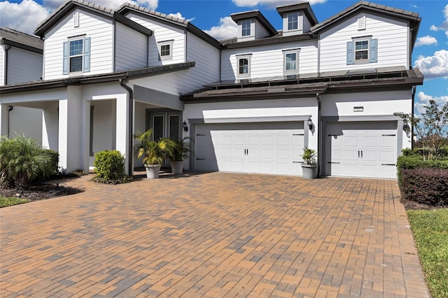 view of front of home with a garage