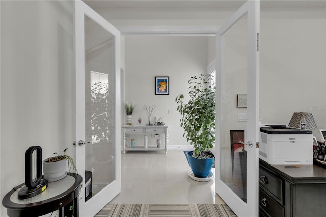 bathroom with tile patterned floors and french doors