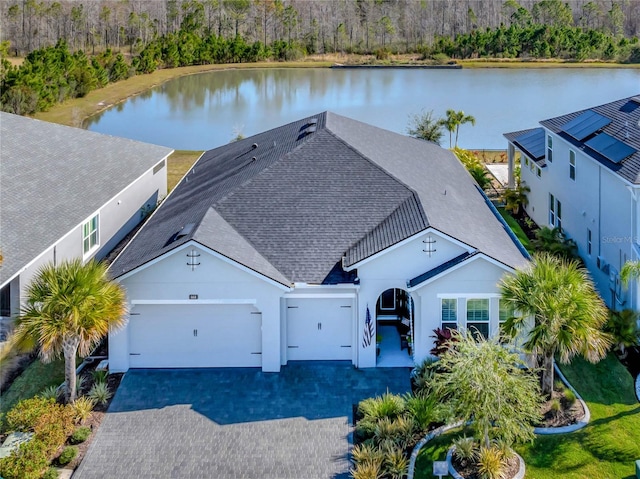 birds eye view of property featuring a water view