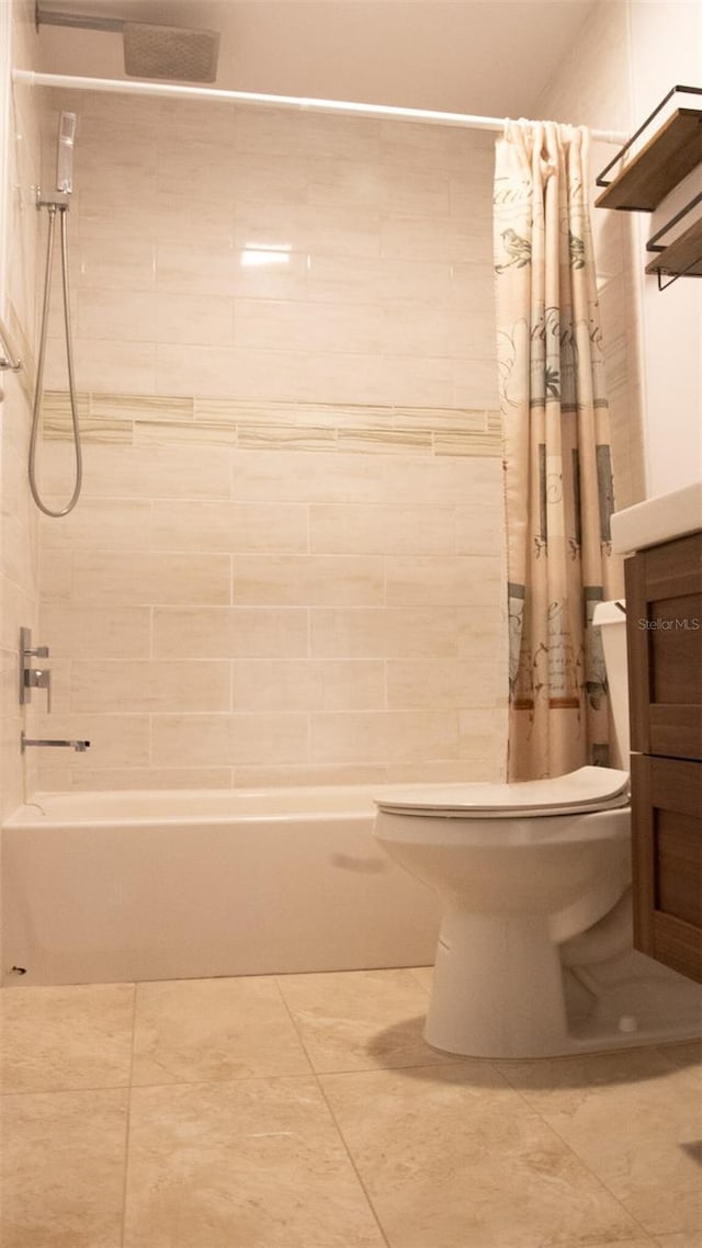 full bathroom featuring toilet, shower / bathtub combination with curtain, vanity, and tile patterned floors