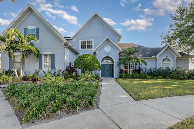 view of front of property with a front lawn