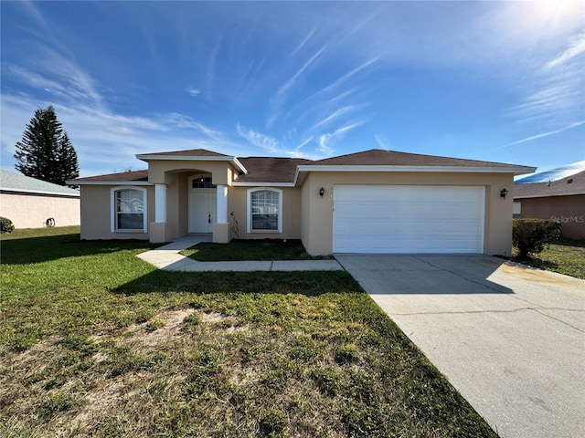 ranch-style home with a garage and a front lawn