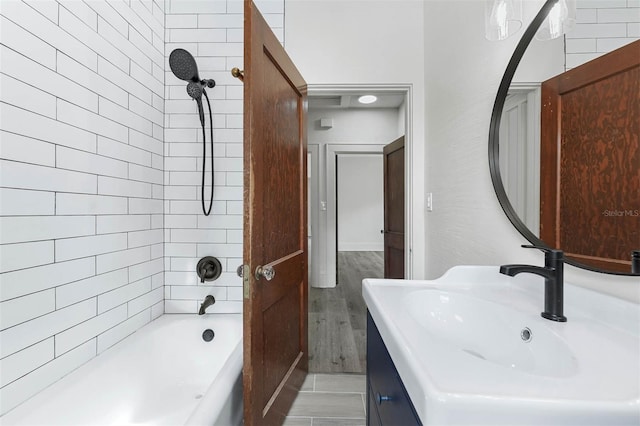 bathroom with vanity and wood-type flooring