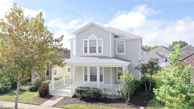 view of front property featuring a porch