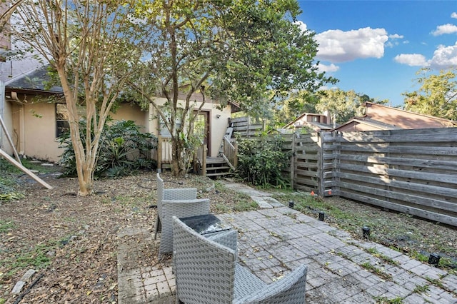 view of patio with a wooden deck