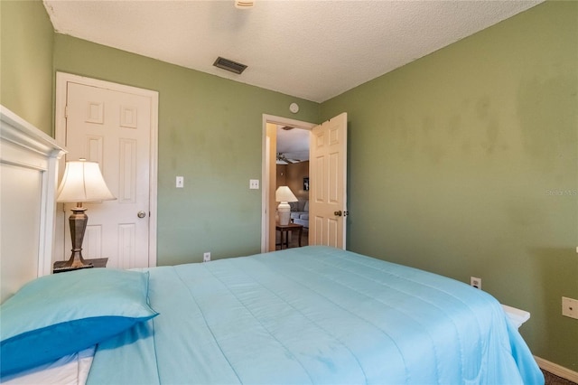 bedroom with a textured ceiling