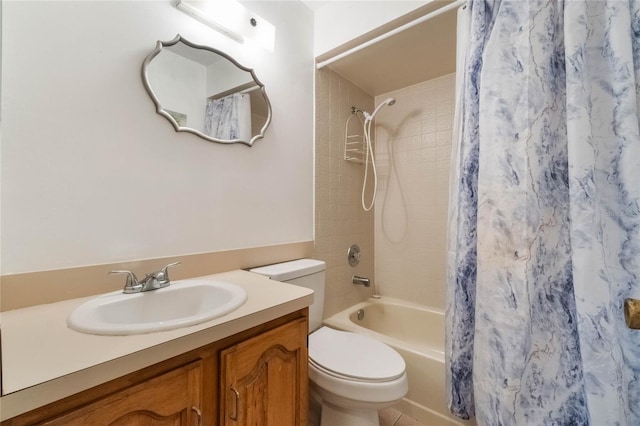 full bathroom with toilet, vanity, and shower / tub combo