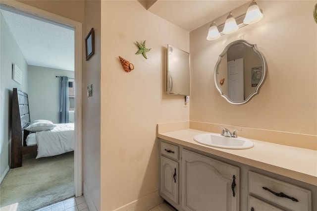 bathroom featuring vanity and tile patterned flooring