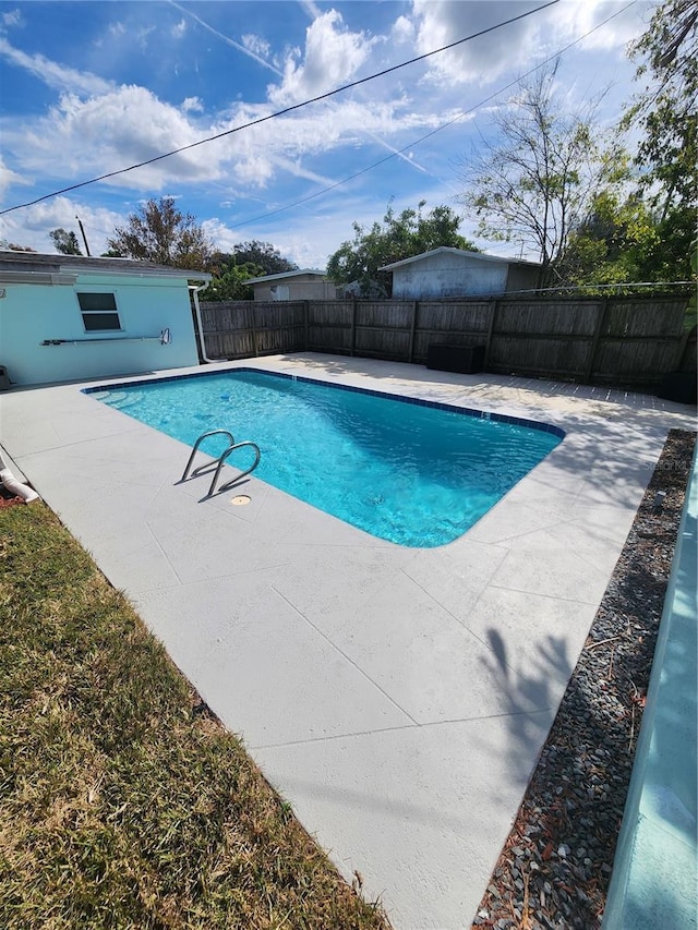 view of pool with a patio area