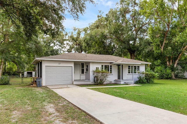 ranch-style house with a front yard and a garage