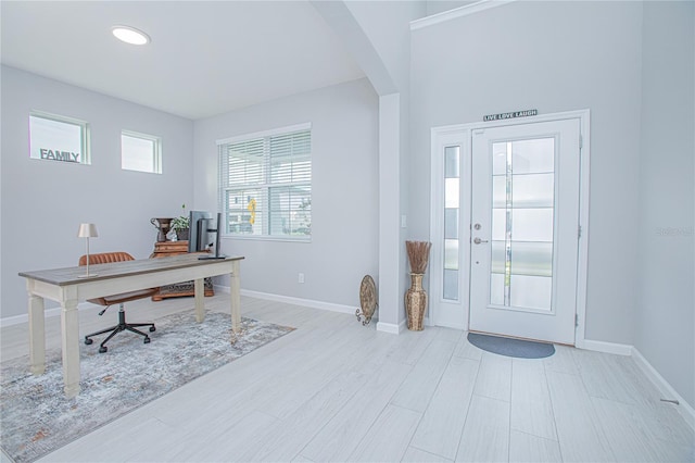 entryway with light hardwood / wood-style floors