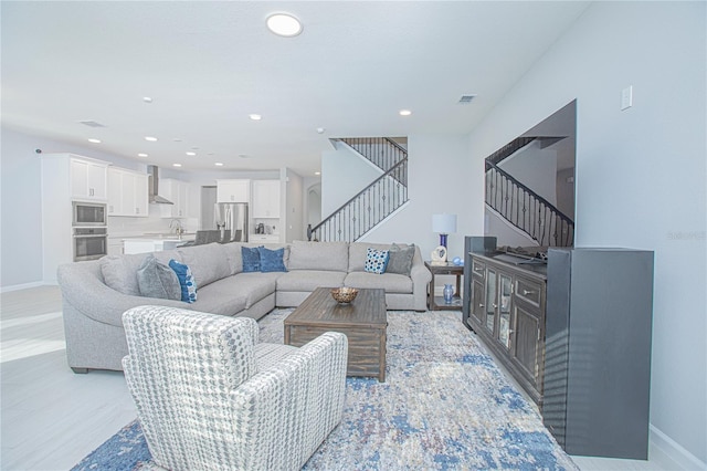 living room featuring sink