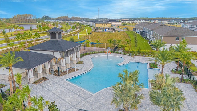 view of swimming pool with a patio