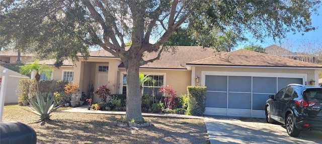 ranch-style home with a garage