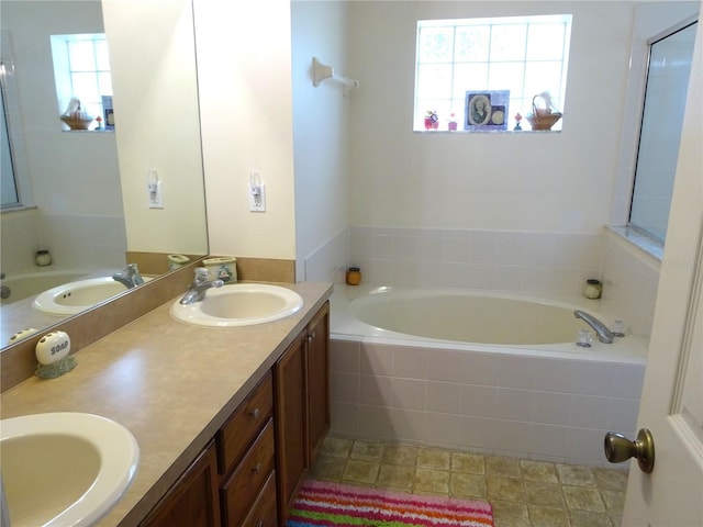 721 Willow Run St, Minneola, FL 34715 - bathroom with a garden tub and double vanity