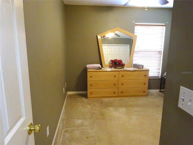 721 Willow Run St, Minneola, FL 34715 - bedroom featuring baseboards and light carpet