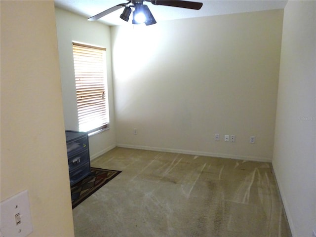 721 Willow Run St, Minneola, FL 34715 - empty room with a ceiling fan, carpet flooring, and baseboards