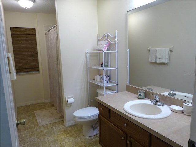 721 Willow Run St, Minneola, FL 34715 - bathroom featuring vanity and toilet