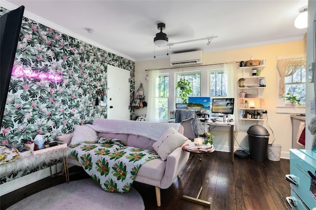 living room featuring dark wood-type flooring, a wall unit AC, ceiling fan, and ornamental molding