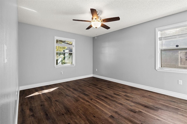 unfurnished room featuring dark hardwood / wood-style floors, a textured ceiling, and ceiling fan