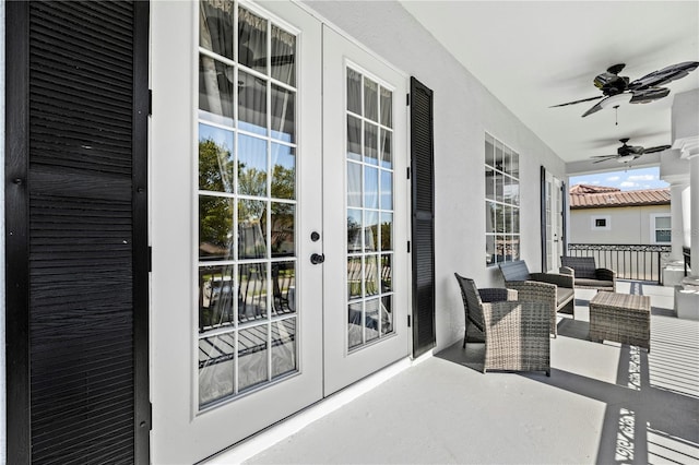 exterior space featuring ceiling fan and french doors