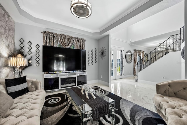 living room with french doors and ornamental molding