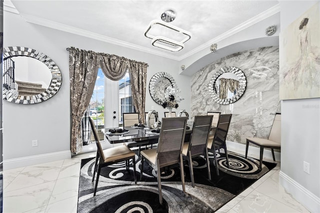 dining area featuring french doors, tile walls, and ornamental molding