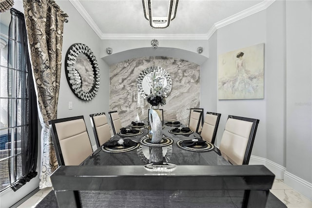 dining room featuring ornamental molding