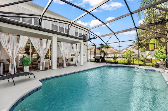 view of pool featuring a patio area and a lanai