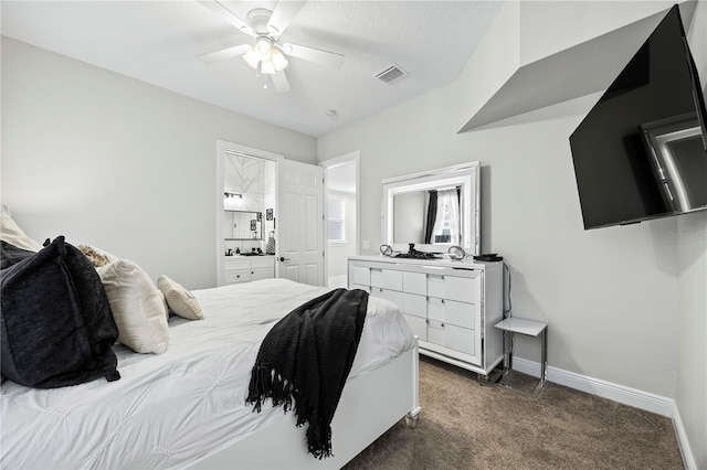 carpeted bedroom featuring connected bathroom and ceiling fan