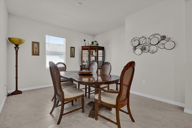 view of tiled dining space