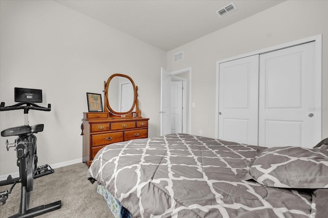 carpeted bedroom with a closet