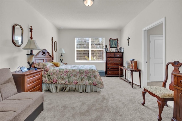 bedroom with light colored carpet