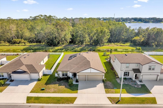 drone / aerial view with a water view